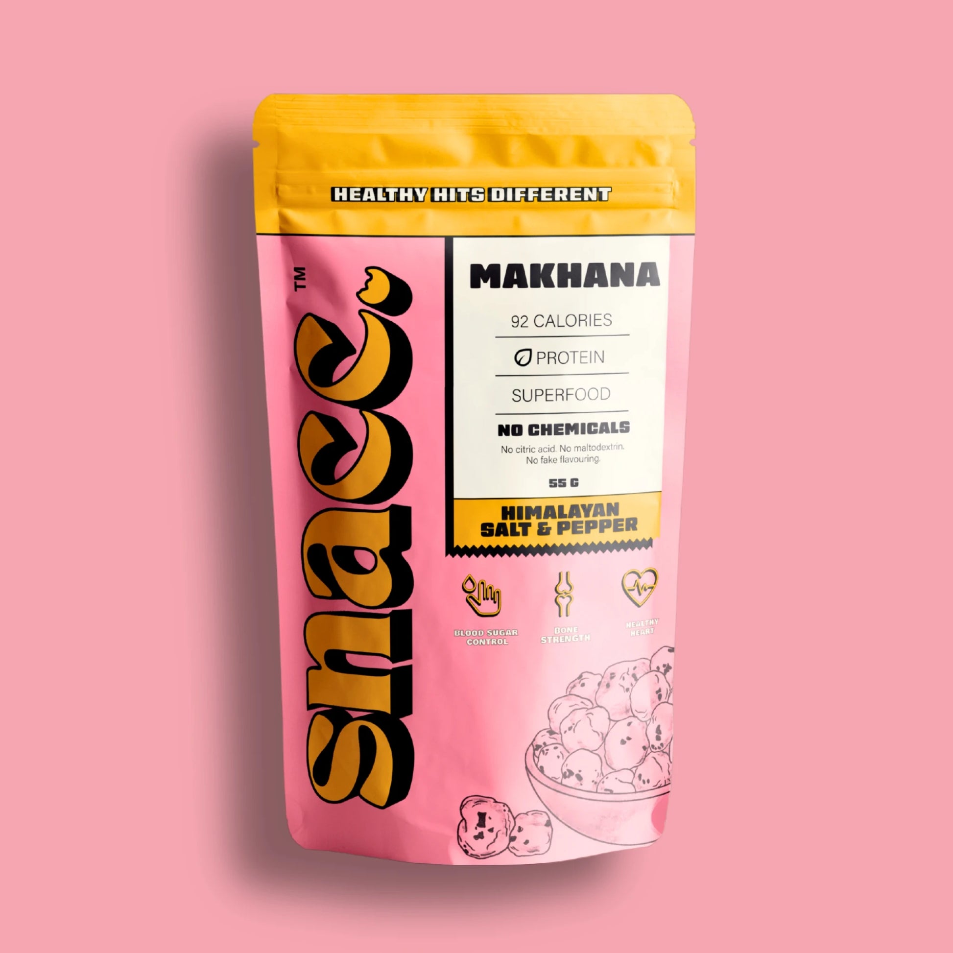 Snacc packaging with pink and yellow design on a pink background