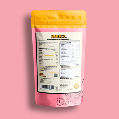 Pink snacc package with a yellow top on a pink background HIMALAYAN SALT AND PEPPER MAKHANA