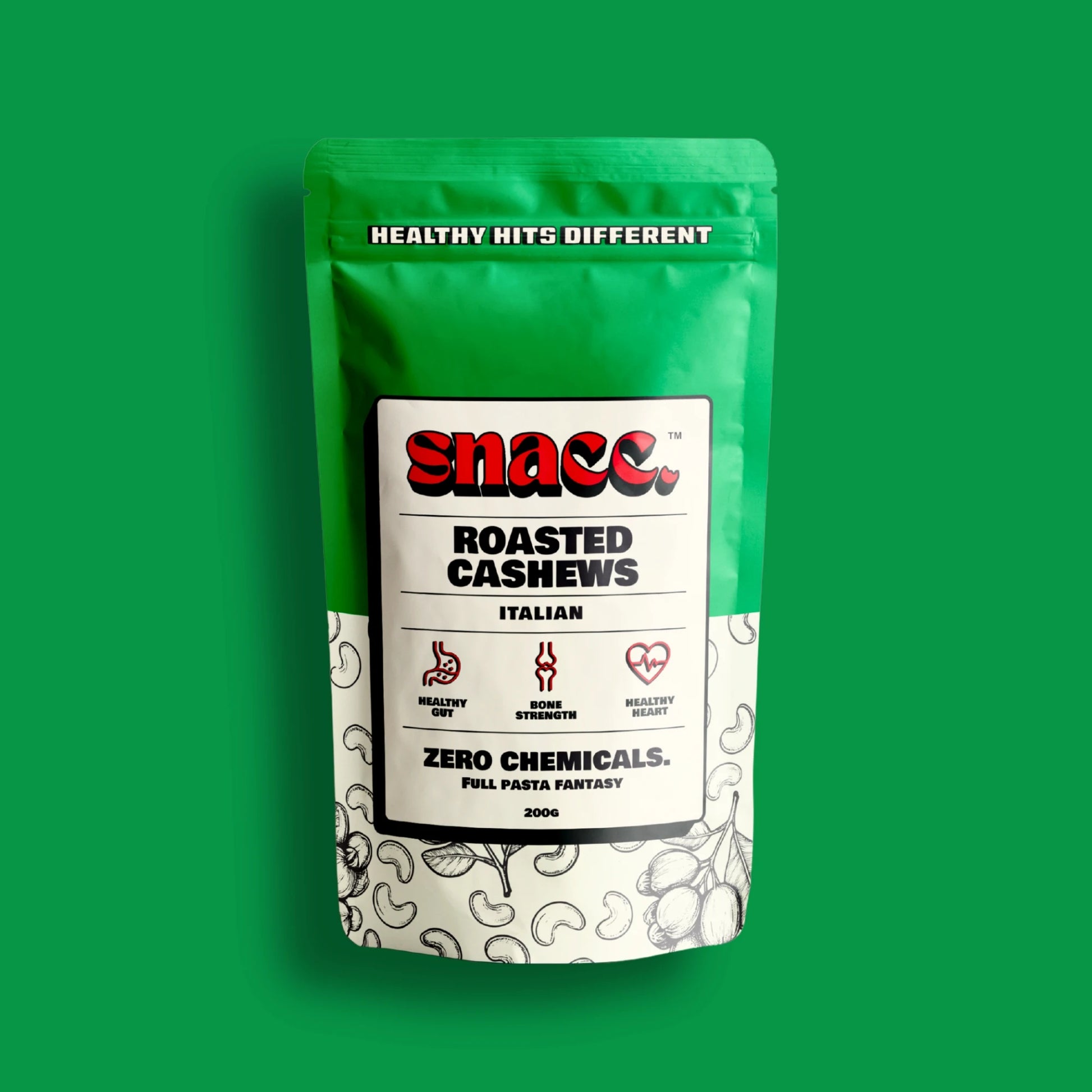 Snacc brand roasted cashews package on a green background
