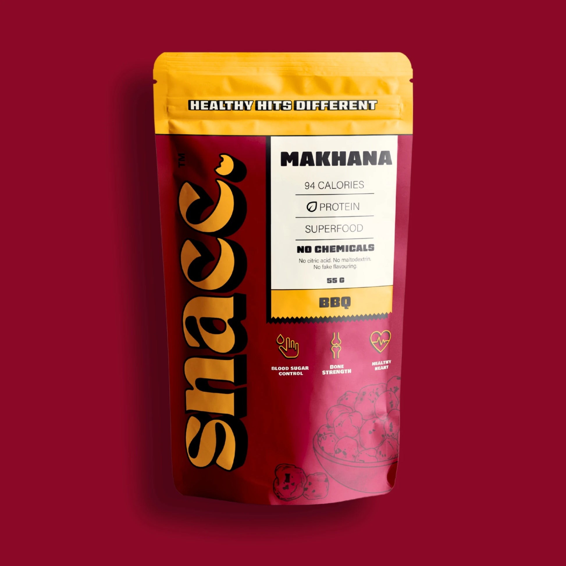 Snacc brand packaging of makhana on a red background
